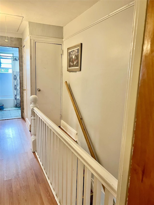 22-26 74th St, East Elmhurst, NY 11370 - hall featuring an upstairs landing, attic access, and wood finished floors