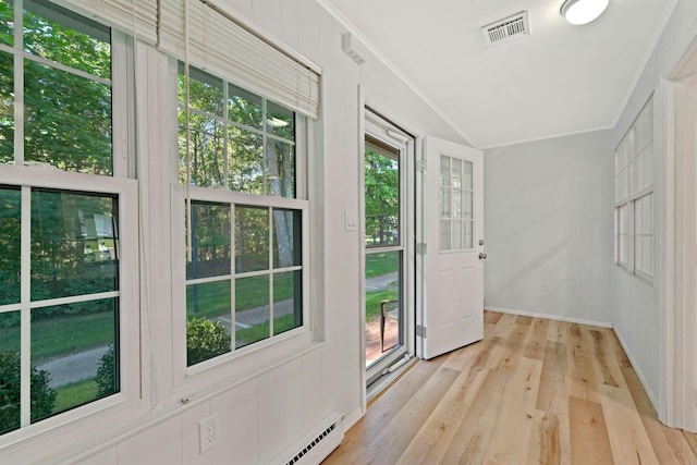305C Torquay Court, Ridge, NY 11961 - doorway featuring plenty of natural light and light wood finished floors