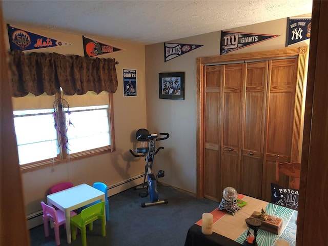 6 Westerly Ct, Hampton Bays, NY 11946 - exercise area with a baseboard radiator and carpet floors