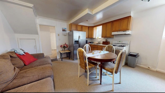 2547 Laconia Ave, Bronx, NY 10469 - kitchen featuring stainless steel refrigerator with ice dispenser, under cabinet range hood, white range with gas stovetop, a sink, and light carpet