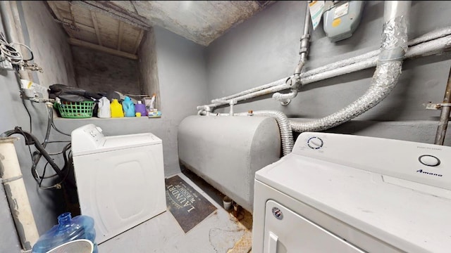 2547 Laconia Ave, Bronx, NY 10469 - laundry area with washing machine and dryer and oil tank