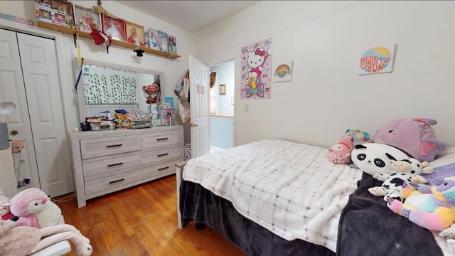 2547 Laconia Ave, Bronx, NY 10469 - bedroom with wood-type flooring and a closet