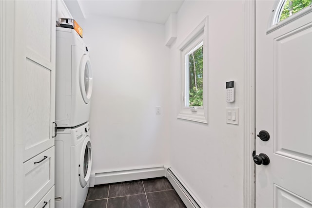1508 Laurel Hollow Rd, Laurel Hollow, NY 11791 - laundry room with stacked washer / drying machine, a baseboard heating unit, and dark tile patterned floors