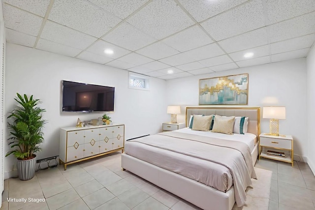 7 Argyle Dr, Shirley, NY 11967 - bedroom featuring light tile patterned floors, a paneled ceiling, and recessed lighting