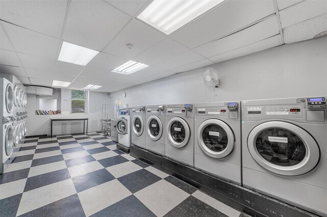472 Gramatan Ave Unit Dd3, Mount Vernon, NY 10552 - community laundry featuring washing machine and clothes dryer, tile patterned floors, and stacked washing machine and dryer