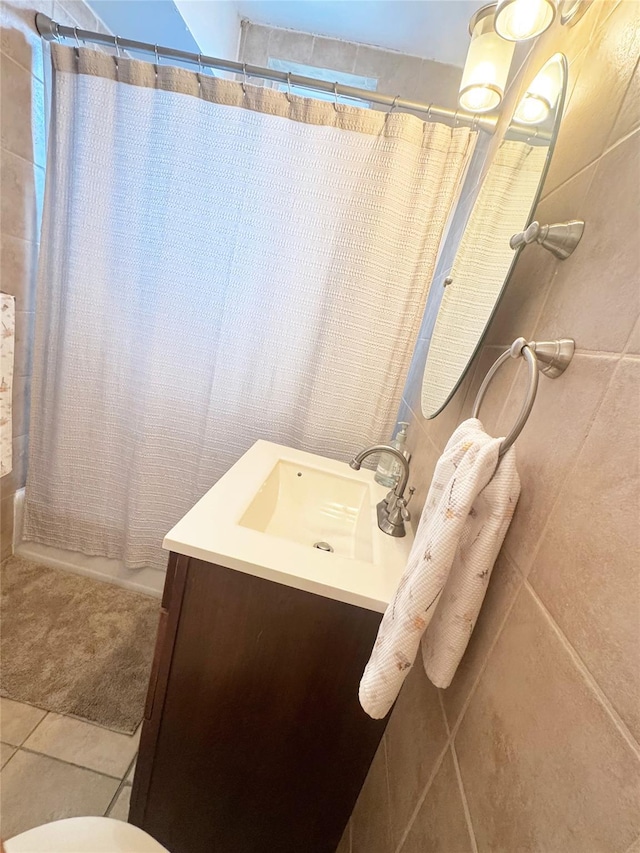 1475 Thieriot Ave Unit 6E, Bronx, NY 10460 - full bath with vanity, shower / tub combo with curtain, tile patterned flooring, and toilet