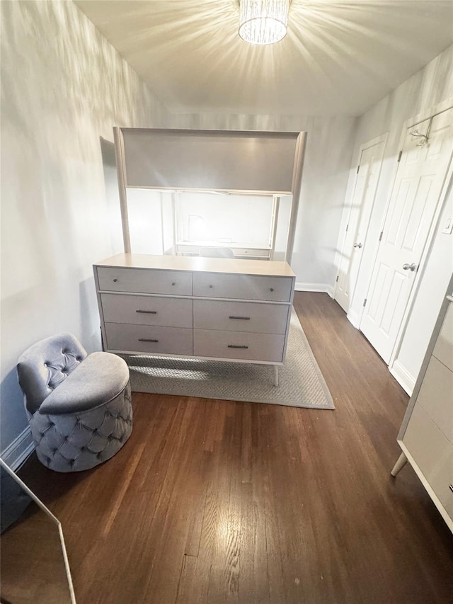 1475 Thieriot Ave Unit 6E, Bronx, NY 10460 - bedroom featuring dark wood-style flooring, a chandelier, and baseboards