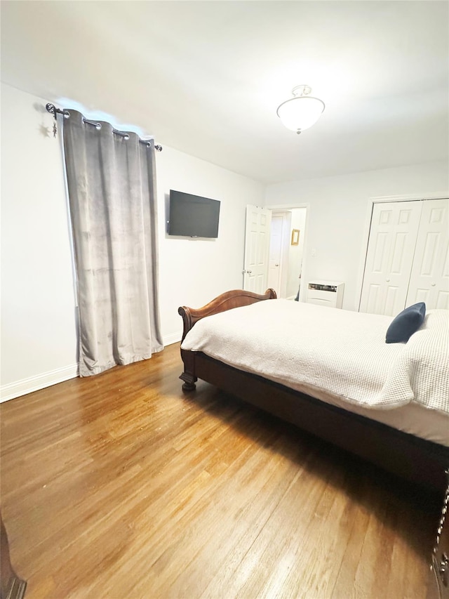 1475 Thieriot Ave Unit 6E, Bronx, NY 10460 - bedroom with wood finished floors, baseboards, and a closet