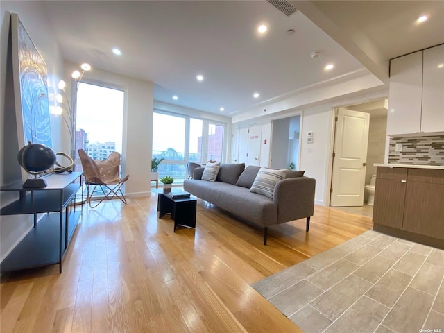 4223 Parsons Blvd Unit 1E, Flushing, NY 11355 - living room featuring light wood finished floors, baseboards, and recessed lighting