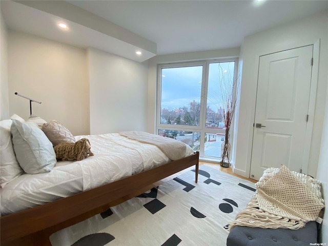 4223 Parsons Blvd Unit 1E, Flushing, NY 11355 - bedroom with recessed lighting and light wood-type flooring