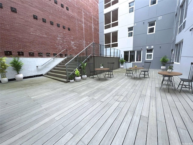 4223 Parsons Blvd Unit 1E, Flushing, NY 11355 - deck with stairway and outdoor dining space