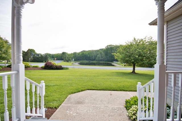 4 Andrew Ct, Florida, NY 10921 - view of grassy yard with a water view and a porch