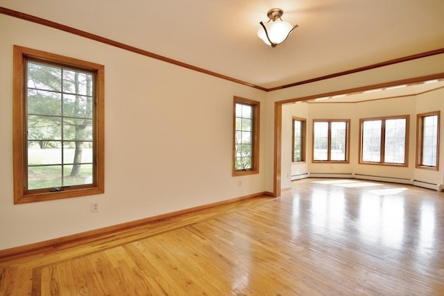 4 Andrew Ct, Florida, NY 10921 - empty room featuring light wood finished floors, ornamental molding, baseboards, a baseboard heating unit, and a baseboard radiator
