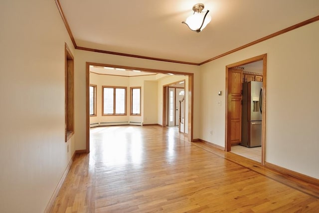 4 Andrew Ct, Florida, NY 10921 - spare room featuring light wood-style flooring, crown molding, baseboards, and baseboard heating