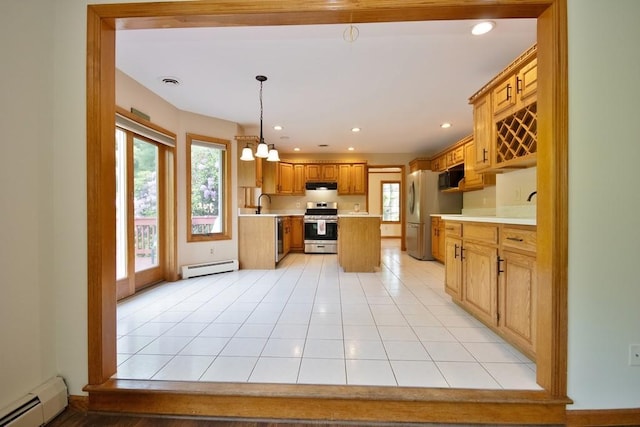 4 Andrew Ct, Florida, NY 10921 - kitchen featuring appliances with stainless steel finishes, baseboard heating, light countertops, healthy amount of natural light, and recessed lighting