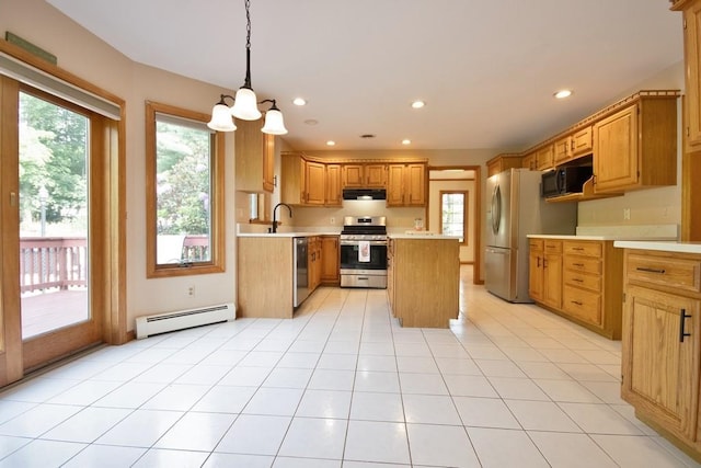 4 Andrew Ct, Florida, NY 10921 - kitchen featuring appliances with stainless steel finishes, under cabinet range hood, a baseboard radiator, light countertops, and a sink