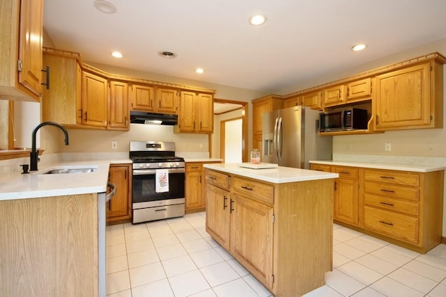 4 Andrew Ct, Florida, NY 10921 - kitchen featuring appliances with stainless steel finishes, a sink, under cabinet range hood, light tile patterned floors, and light countertops