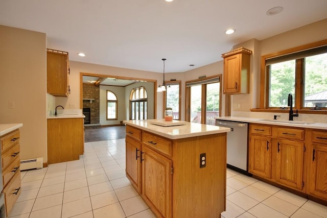 4 Andrew Ct, Florida, NY 10921 - kitchen with dishwasher, a sink, a baseboard heating unit, a center island, and light countertops
