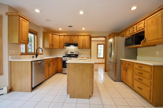 4 Andrew Ct, Florida, NY 10921 - kitchen with appliances with stainless steel finishes, under cabinet range hood, a sink, a center island, and light countertops