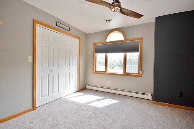 4 Andrew Ct, Florida, NY 10921 - unfurnished bedroom featuring a baseboard heating unit, carpet flooring, a closet, and baseboards