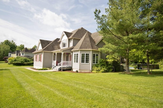4 Andrew Ct, Florida, NY 10921 - view of front of house with a front lawn and roof with shingles
