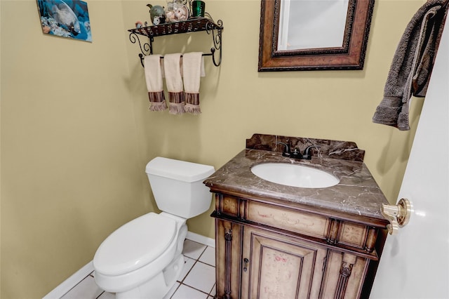 4 Waters Edge Unit 4, Shirley, NY 11967 - bathroom featuring baseboards, toilet, vanity, and tile patterned flooring