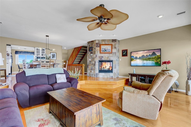 4 Waters Edge Unit 4, Shirley, NY 11967 - living area with ceiling fan, light wood finished floors, baseboards, a fireplace, and recessed lighting