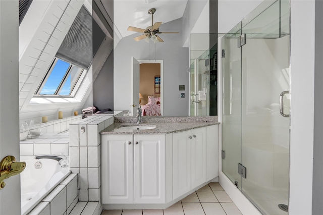 4 Waters Edge Unit 4, Shirley, NY 11967 - full bathroom featuring a skylight, connected bathroom, a stall shower, a garden tub, and vanity