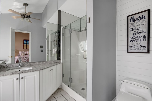 4 Waters Edge Unit 4, Shirley, NY 11967 - bathroom featuring ensuite bath, a ceiling fan, double vanity, a shower stall, and tile patterned floors