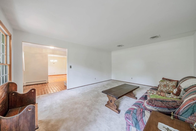 7 Sandpiper Ct, Shoreham, NY 11786 - carpeted living room featuring a chandelier and a baseboard radiator