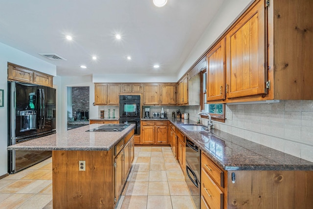 7 Sandpiper Ct, Shoreham, NY 11786 - kitchen featuring black appliances, brown cabinets, decorative backsplash, and recessed lighting