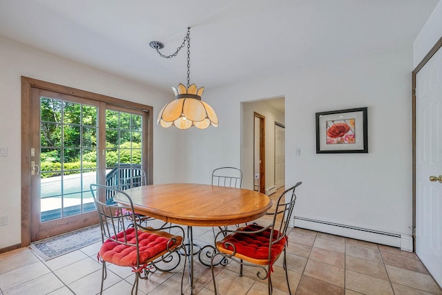 7 Sandpiper Ct, Shoreham, NY 11786 - dining room with a baseboard heating unit, light tile patterned floors, and baseboards