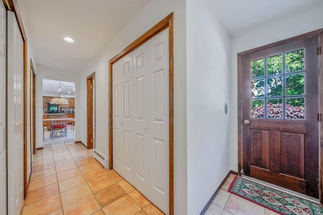 7 Sandpiper Ct, Shoreham, NY 11786 - foyer entrance featuring light tile patterned flooring, a baseboard radiator, recessed lighting, and baseboards