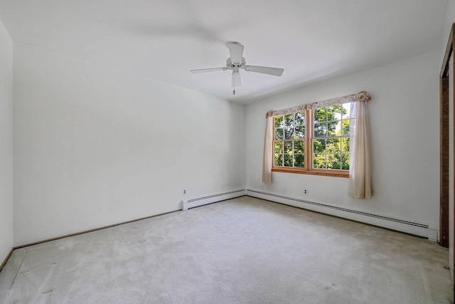 7 Sandpiper Ct, Shoreham, NY 11786 - unfurnished room featuring carpet flooring, ceiling fan, and a baseboard radiator