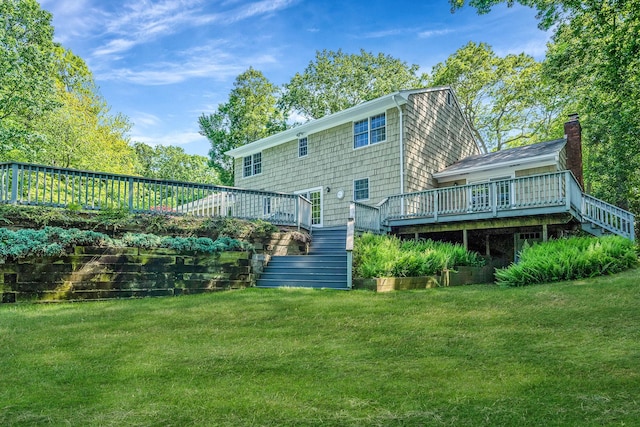7 Sandpiper Ct, Shoreham, NY 11786 - back of property with stairs, a wooden deck, and a yard