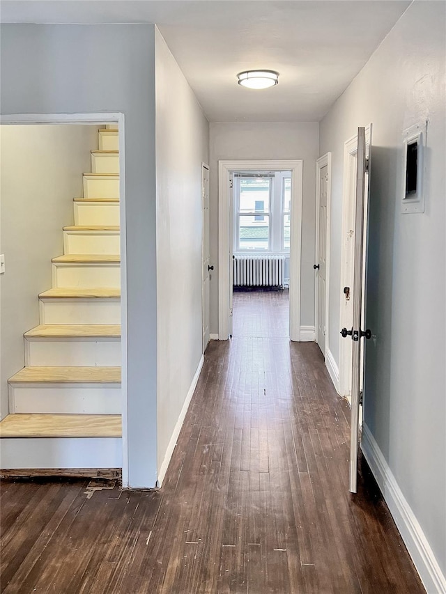 320 E 235th St, Bronx, NY 10470 - hall with radiator, hardwood / wood-style floors, baseboards, and stairs