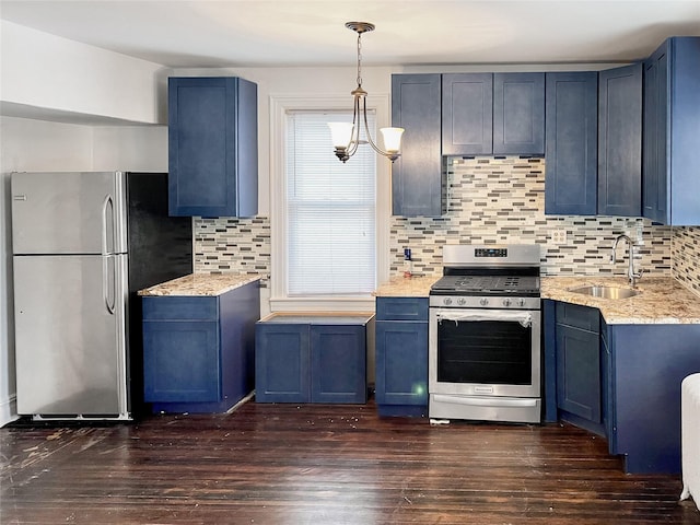 320 E 235th St, Bronx, NY 10470 - kitchen with appliances with stainless steel finishes, a sink, blue cabinets, and tasteful backsplash