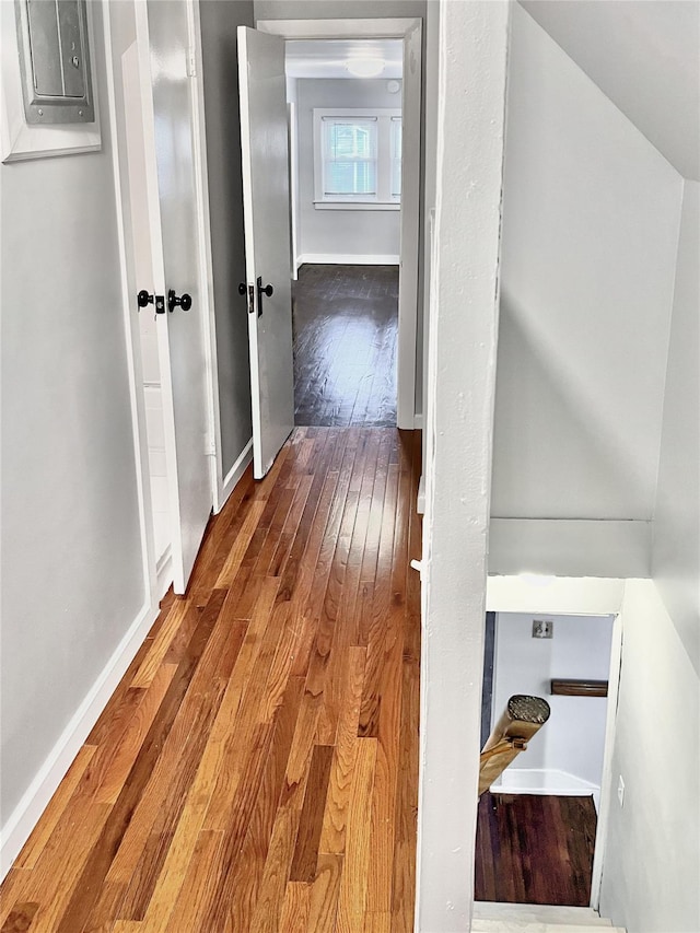 320 E 235th St, Bronx, NY 10470 - hall with electric panel, hardwood / wood-style flooring, and baseboards