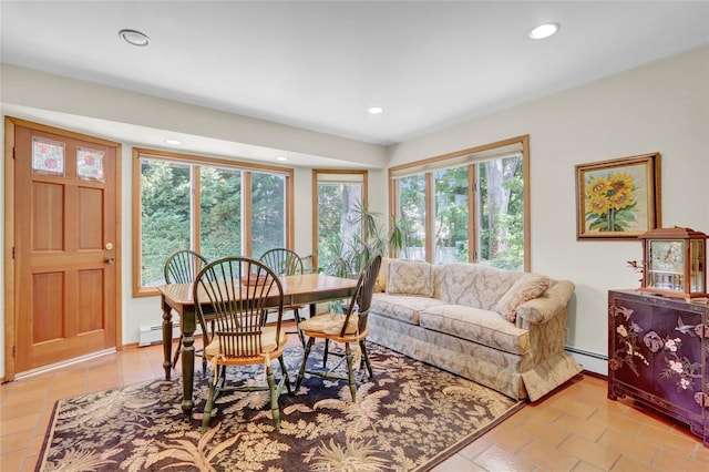 195 Loines Ave, Merrick, NY 11566 - dining area with recessed lighting, baseboards, and a baseboard radiator