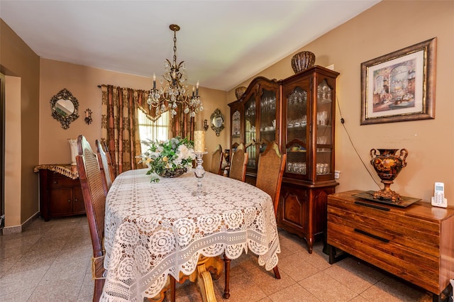 21AKA16 Larkspur Ln, Yonkers, NY 10704 - dining area with a chandelier, granite tiled floors, and baseboards