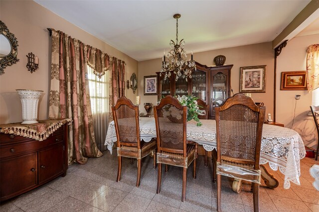 21AKA16 Larkspur Ln, Yonkers, NY 10704 - dining room with granite floors and a chandelier