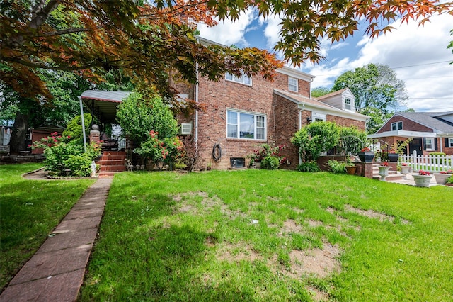 21AKA16 Larkspur Ln, Yonkers, NY 10704 - view of front of home with brick siding and central AC