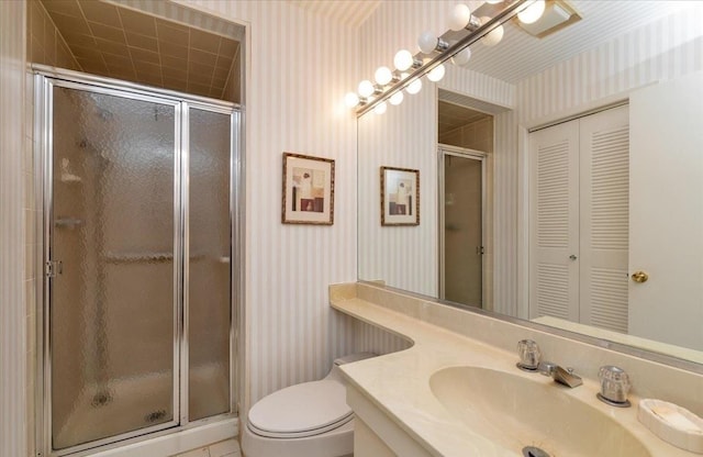 9 Everit Ave Unit A10, 11, Hewlett, NY 11557 - full bath featuring wallpapered walls, vanity, a shower stall, toilet, and a closet
