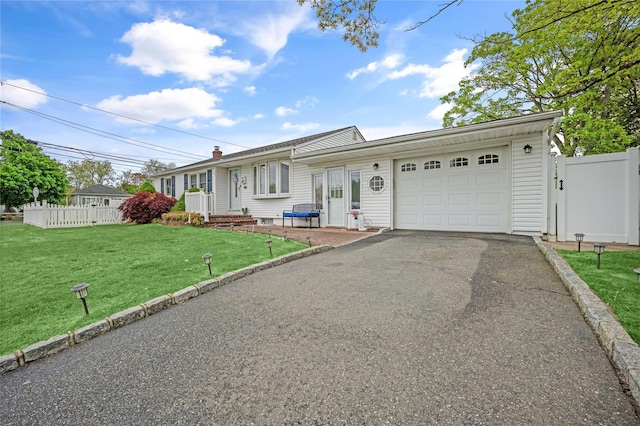 56 15th Ave, West Babylon, NY 11704 - single story home with a garage, asphalt driveway, and a chimney
