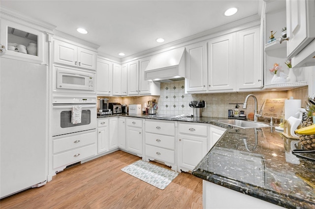56 15th Ave, West Babylon, NY 11704 - kitchen featuring white appliances, a sink, white cabinetry, wall chimney range hood, and recessed lighting