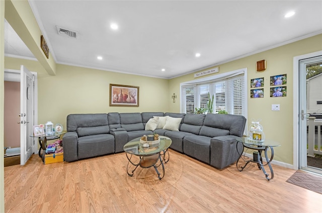 56 15th Ave, West Babylon, NY 11704 - living area featuring wood finished floors, ornamental molding, recessed lighting, and baseboards