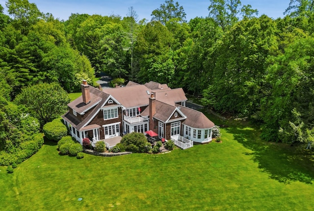 61 Carolyn Pl, Chappaqua, NY 10514 - aerial view of property and surrounding area featuring a heavily wooded area