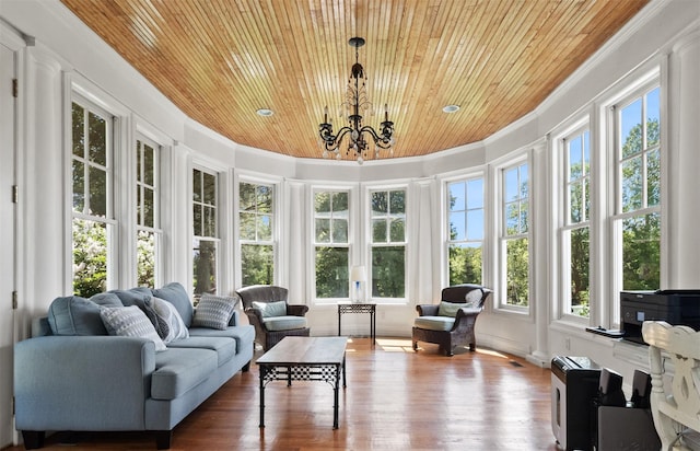 61 Carolyn Pl, Chappaqua, NY 10514 - sunroom with wooden ceiling, plenty of natural light, crown molding, french doors, and wood finished floors