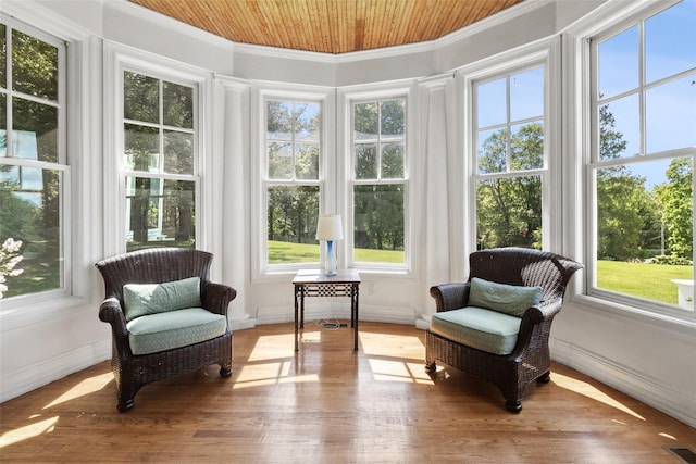 61 Carolyn Pl, Chappaqua, NY 10514 - sunroom / solarium with baseboards, wood finished floors, crown molding, and wood ceiling