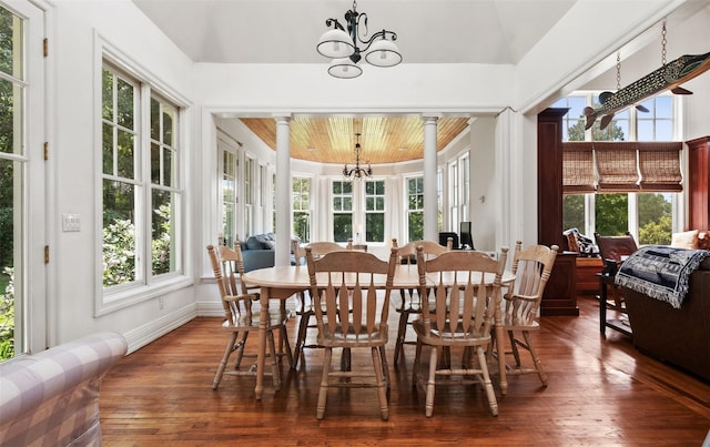 61 Carolyn Pl, Chappaqua, NY 10514 - dining area with a chandelier, wooden ceiling, hardwood / wood-style floors, decorative columns, and plenty of natural light
